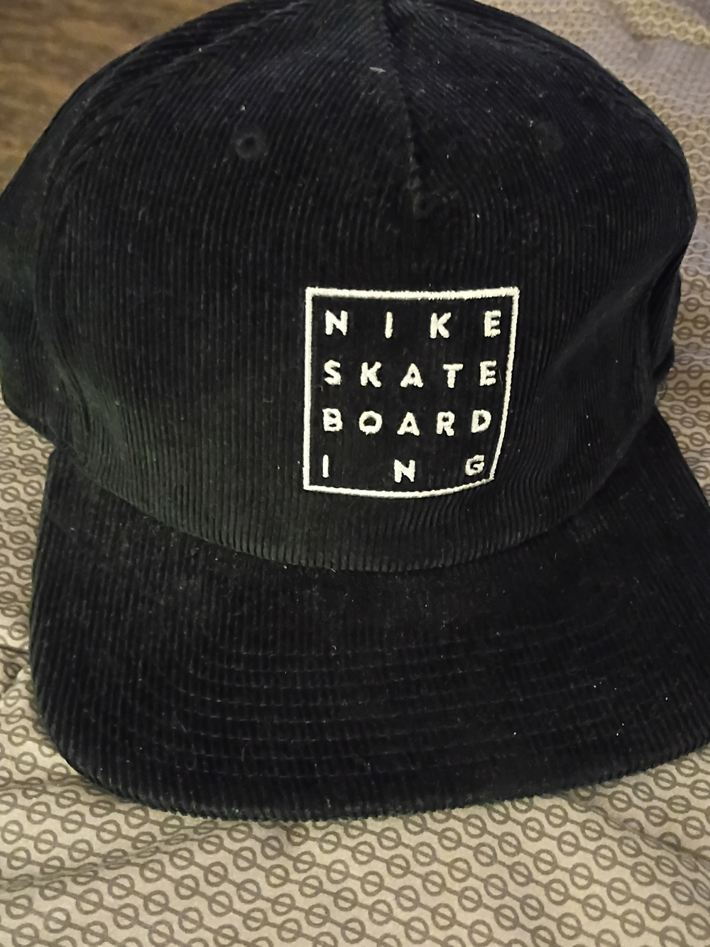 Nike SB Black Corduroy Skateboarding Cap with White Logo